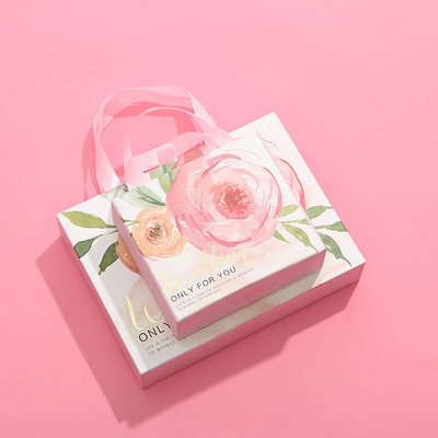Las cajas de regalo de seda rosadas de la joyería de la bufanda abultan caja de los cosméticos de la mano del rectángulo